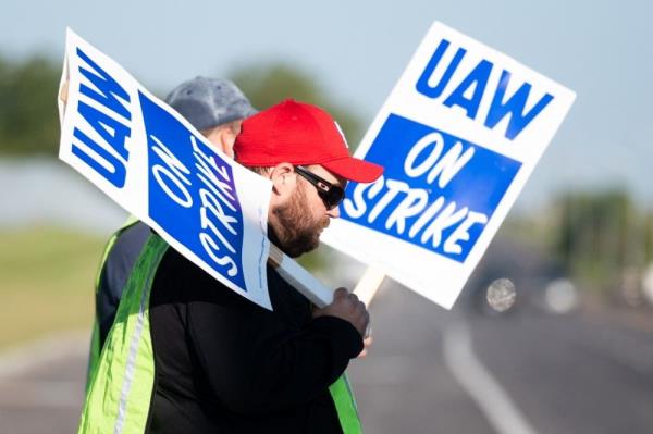 US auto workers strike, posing threat to economy — and Biden